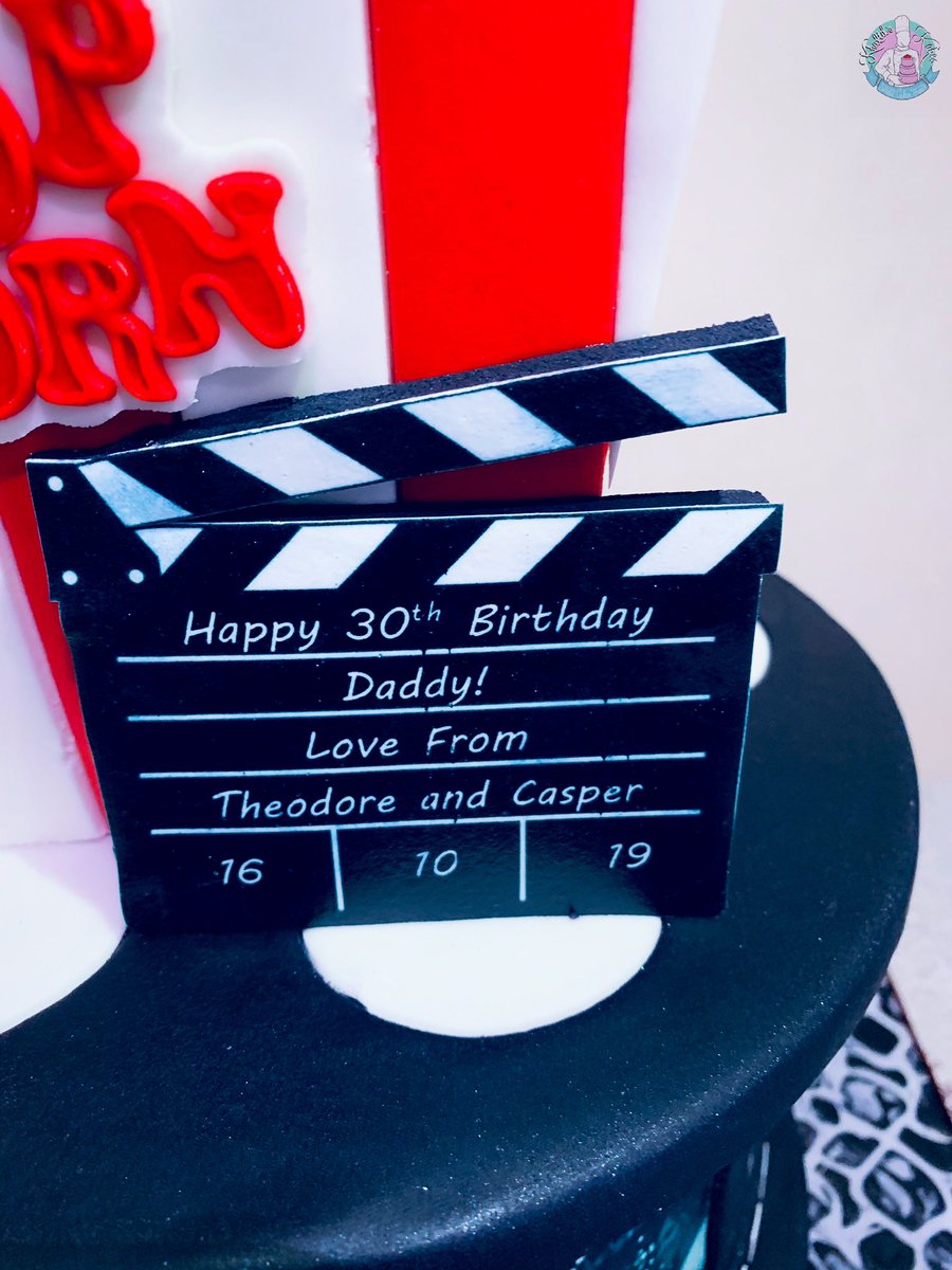 khalidskakes's tweet photo. A movie reel cake made for a special daddy! Customised with his photos and topped with a personalised clapperboard. #movienight #FilmTwitter #action #popcorn #snacks #yesitscake https://t.co/UaoM2wbyE6