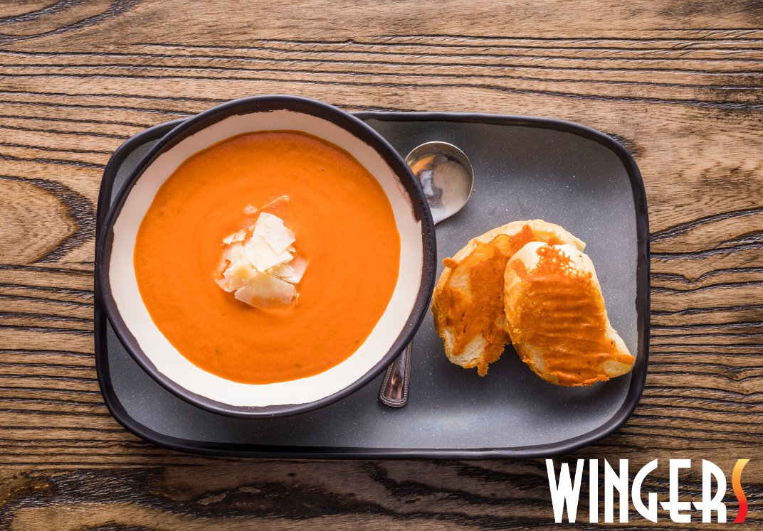 WingersRG's tweet photo. Warm up on this chilly day with a hot bowl of WINGERS🔥 creamy tomato basil bisque soup served with our amazing cheese bread!! https://t.co/FHnhKNh8aR