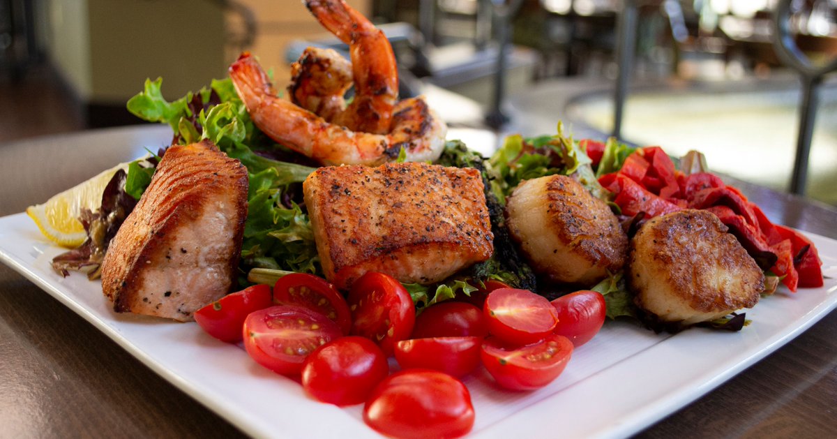 Feeling the winter weather today, just in time for our winter menu! Enjoy a Surf Salad which includes sautéed salmon, shrimp, and scallop / mixed greens / tomato / cucumber / roasted red peppers / hard-boiled egg / asparagus / roasted tomato Old Bay® vinaigrette
