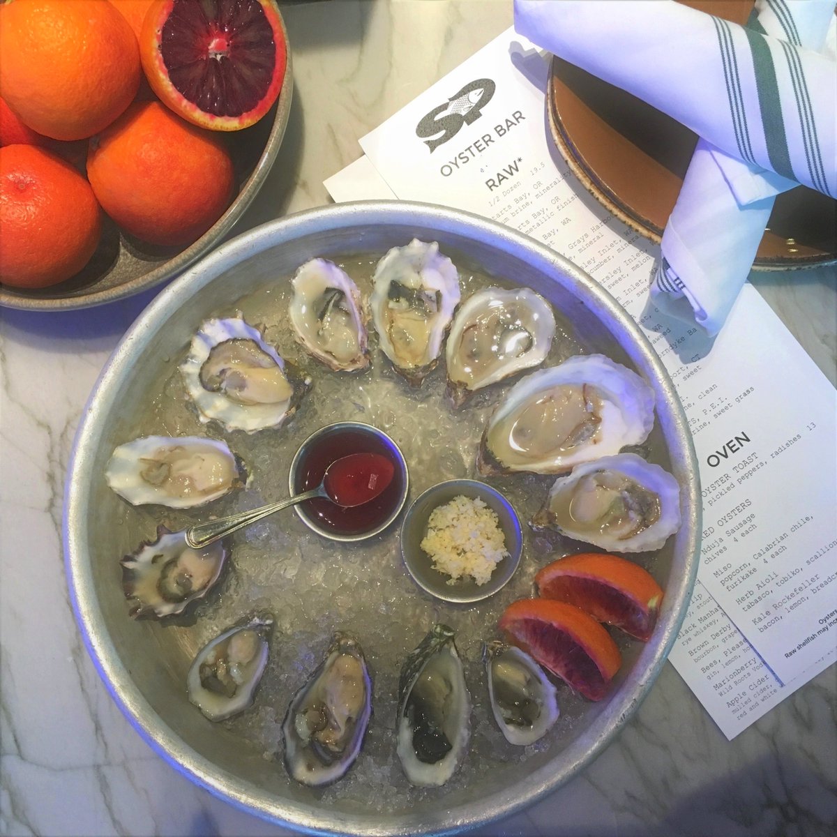 NEW MIGNONETTE ALERT❗❕
Back and better than ever! Blood Orange ~ blood orange, red wine vinegar, shallot, black pepper

A dozen on the half shell are calling your name. 😉