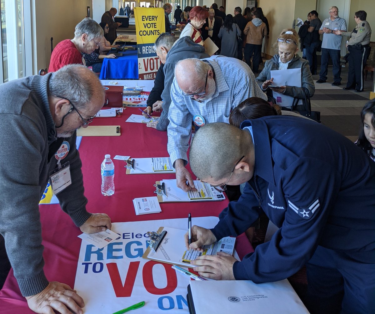 dacclerk's tweet photo. Voter Registration Agents with the Doña Ana County Clerk's Office were present today for an Immigration and Naturalization Ceremony for 149 individuals from 21 countries, to register to vote. #DACelections #DACvotes https://t.co/7Daj1KHMq8
