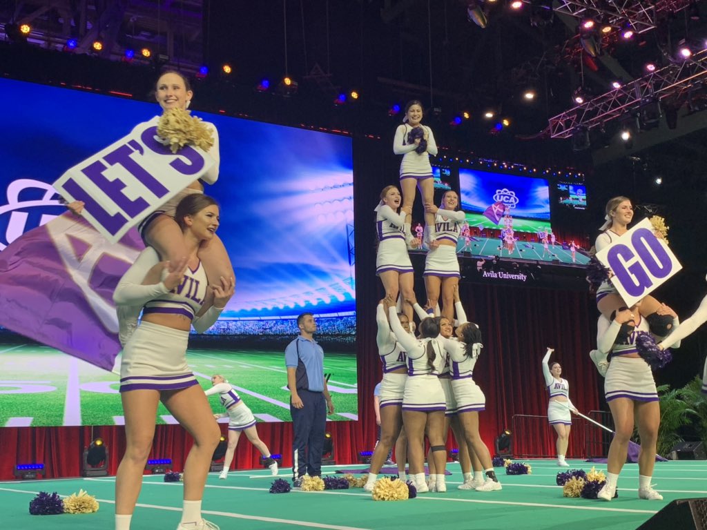 UCAupdates's tweet photo. We are ALL on our feet in Arena South for Open ALL Girl Game Day Finals! #UCAnationals 💁‍♀️💙💛 https://t.co/dP0QQlWGcf