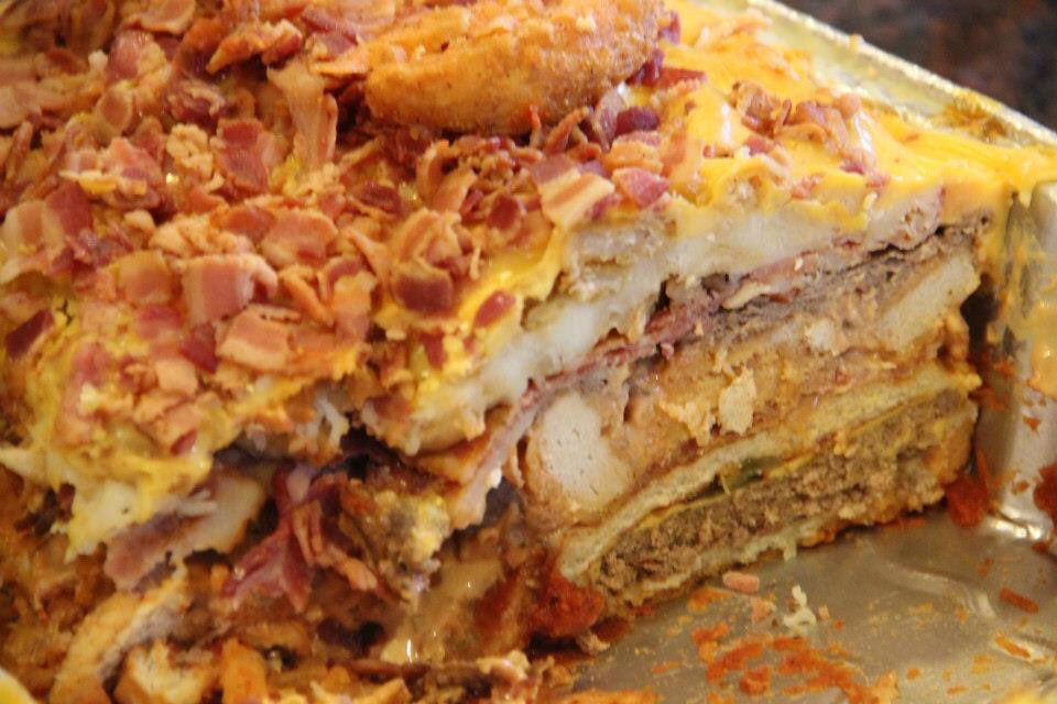 joshdaghir's tweet photo. @hannahvsthemany Indexes more on super bad for you than delicious, but (bottom to top): Marinara, burgers, thousand island, bacon, chicken nuggets, thousand island, steak ums, bacon, french fries, potato wedges, kraft singles, bacon bits. Potato wedges for garnish. https://t.co/I0oic9X8th