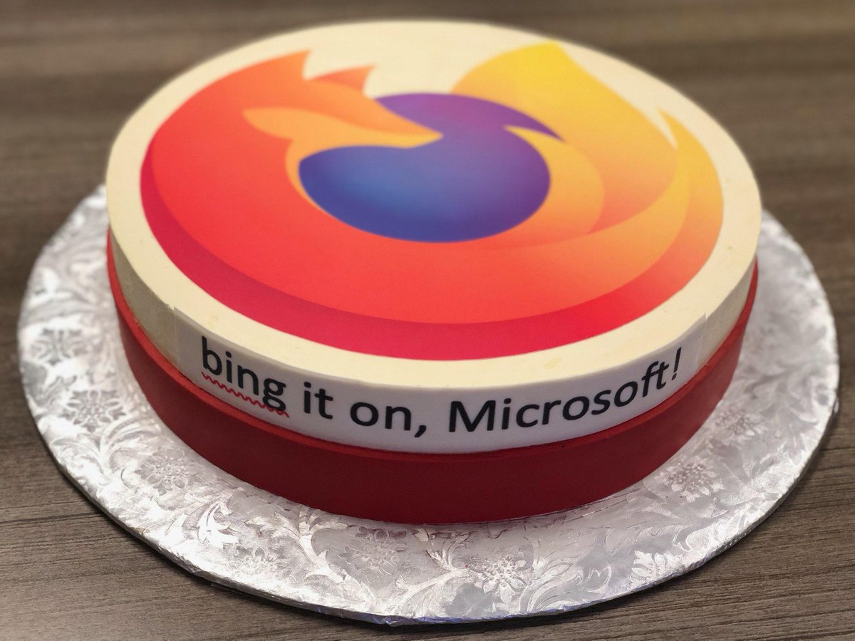 round cake with Firefox logo, text says "bing it on, Microsoft"