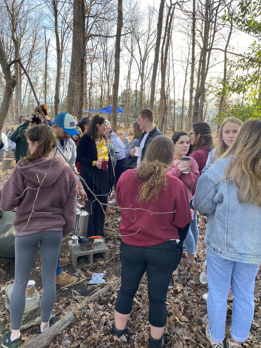 scomorrison's tweet photo. So much fun having @ElonConnieBook join us in #COR424 this week! She greeted the #guardiantree, started the fire, drank tea made from our @KellyKettleUSA, played a game of camouflage, and listened to students share what they have learned. #perfectafternoon #ElonEd https://t.co/YzNXmX0mBe