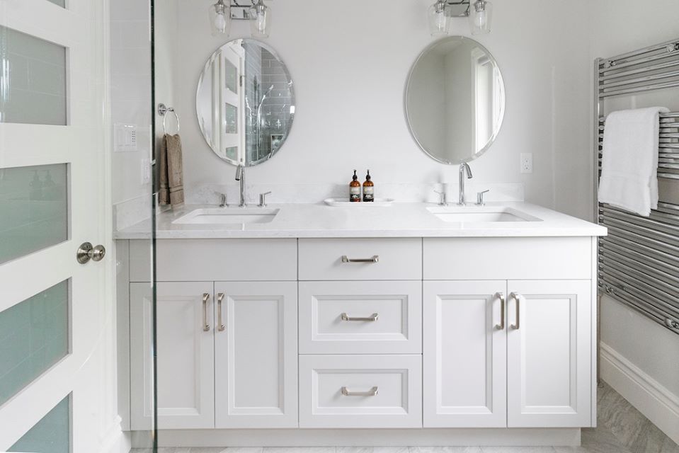 A hot water towel warmer and custom cabinetry (by Cabinet Effects - Custom Cabinetry &amp; Woodworking) were a must for this master bath. Learn more about this two-storey addition project here >>> bit.ly/2kKYSVj |#renosbymenno #kwawesome #waterloo