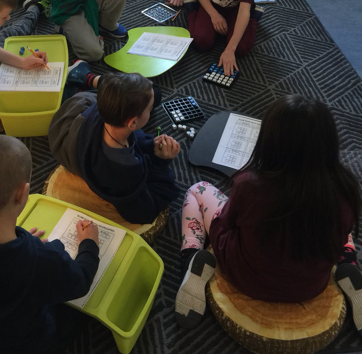 KatlinStrand's tweet photo. Today during our buddy/mentor time with the Grade 5s, students completed a “Which One Doesn’t Belong” journal prompt and played “Slam Dunk with Regrouping” using our dice trays @bigrockbadger @fsd38 #abed #mathed https://t.co/2JeSRKWcCG