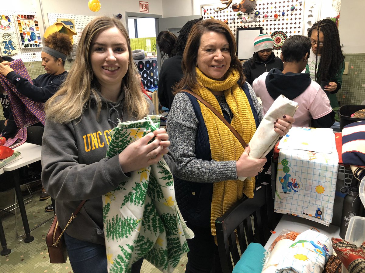 UNCG's tweet photo. “Service” is our University’s motto and Spartans are making an impact in the Greensboro community for our annual #MLKDayofService! Even faculty and staff like @uncgvcsa are out volunteering. 💙💛 #UNCGService #MLKDay https://t.co/1VqgXmk90d