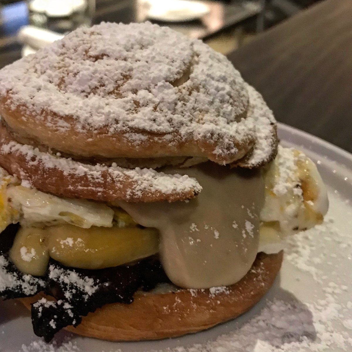 LiterHouse's tweet image. BRUNCH MELT UPDATE: Puerto Rican sweet bread with brown butter anglaise, fried eggs, crispy pork belly, raclette, and powdered sugar!