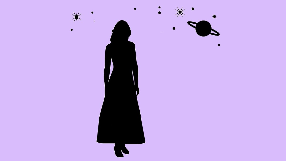Silhouette of a woman below Saturn and the stars