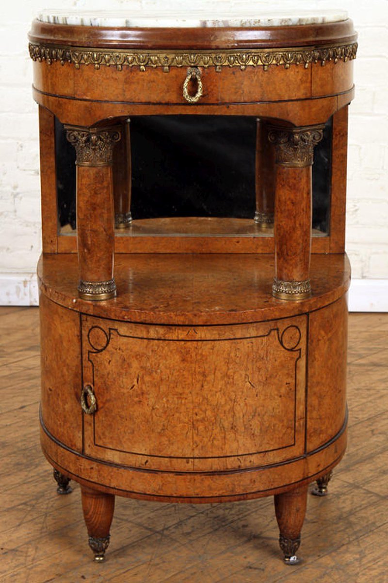 Auctionzip's tweet photo. 100 years later, some designs will always be in style. A French burl walnut stand circa 1920 and others available now : https://t.co/xZW6Ttyqjd https://t.co/y5vw4AJQAZ
