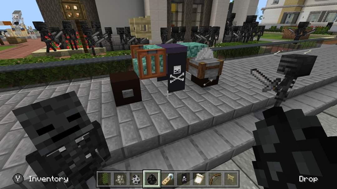 We got a add on pack with cute pets and a city. Instead of playing with adorable pets, he's declared himself "King of the Skeletons", spawned a black skeleton army and made a motorbike out of scrap. #Minecraft