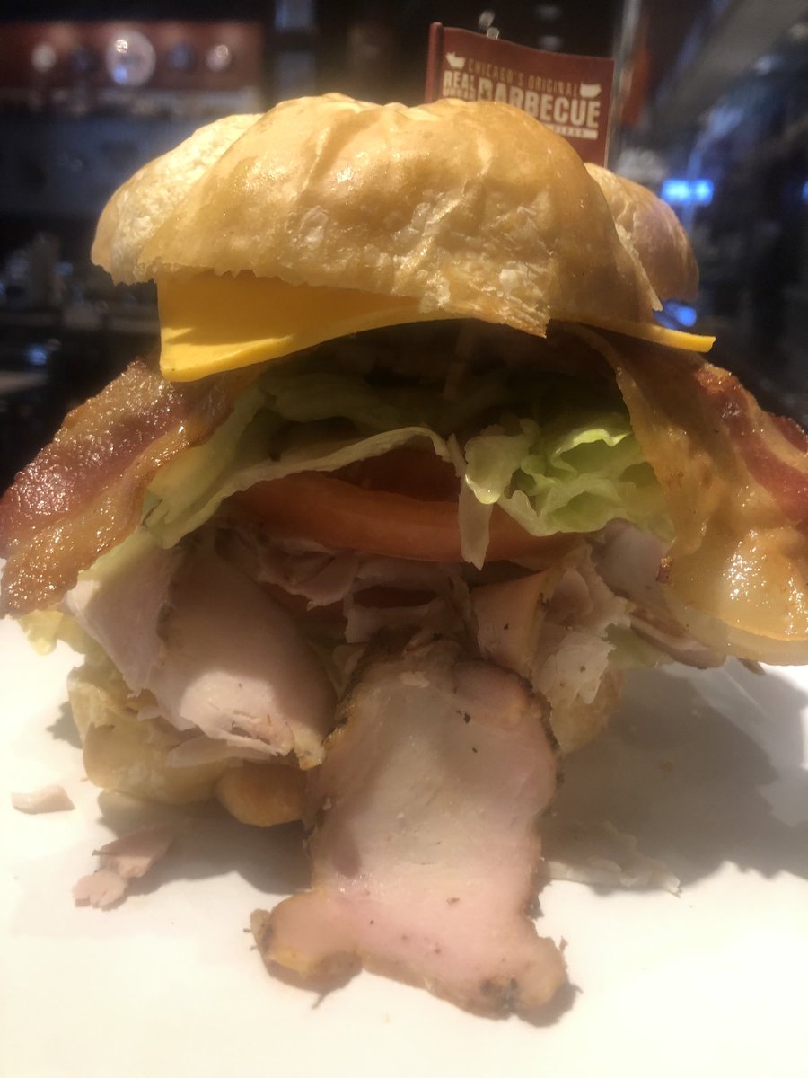 2 fisted Smoked Turkey Croissant happening in Highland Park right now!