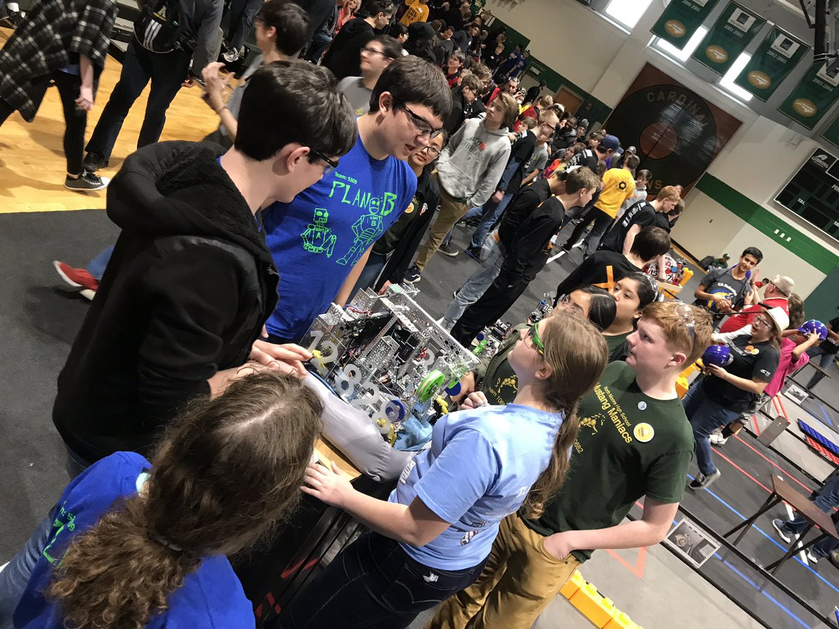 Team 10682 - Mustang Maniacs from <a href="/NorthMooreHigh/">North Moore High</a> talking strategy with their Alliance before elimination matches start.