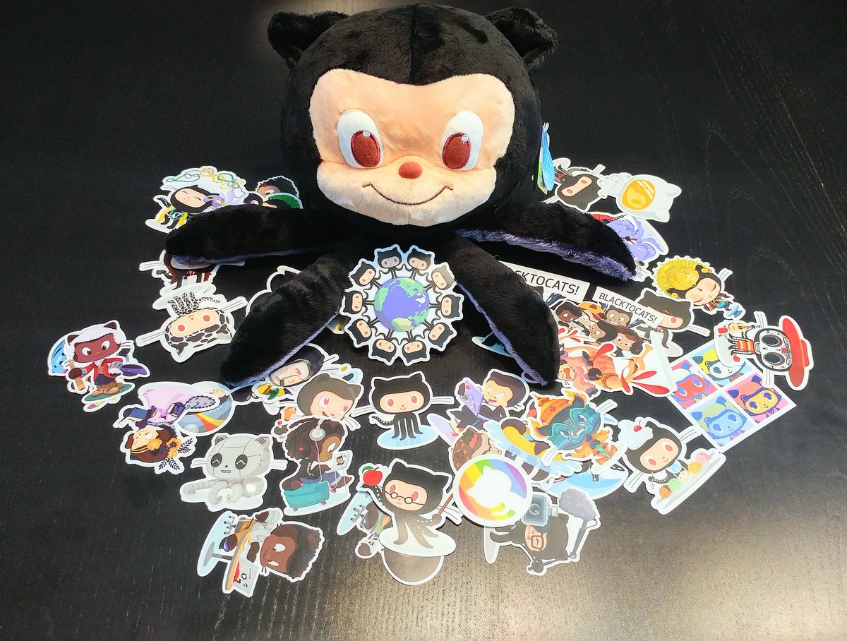 michael_y_e's tweet photo. Package received! Thank you @GitHubEducation for the awesome plushie and stickers! 
#GitHubSwag https://t.co/BV7EPtOPmz