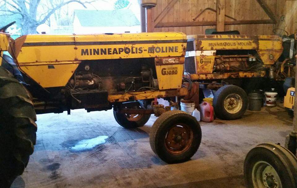 sprayertech's tweet photo. Moving these two consecutive serial number MM G1000 prototype/pilot tractors along. Only 100 of these were made in diesel!  Both ordered by Chenoweth Imp in Macomb, IL. #96 (right) needs engine work, #97 (left) runs, drives.  $6900 for the pair. Retweets appreciated! https://t.co/BhMTDfAA06