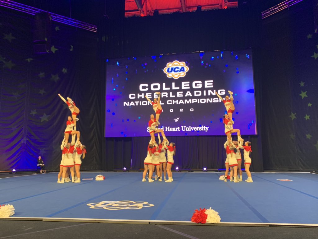 UCAupdates's tweet photo. We are loving all these top notch performances we are getting in All Girl Division I finals!💛💙📣 #UCAnationals https://t.co/D7yKOmi1QS