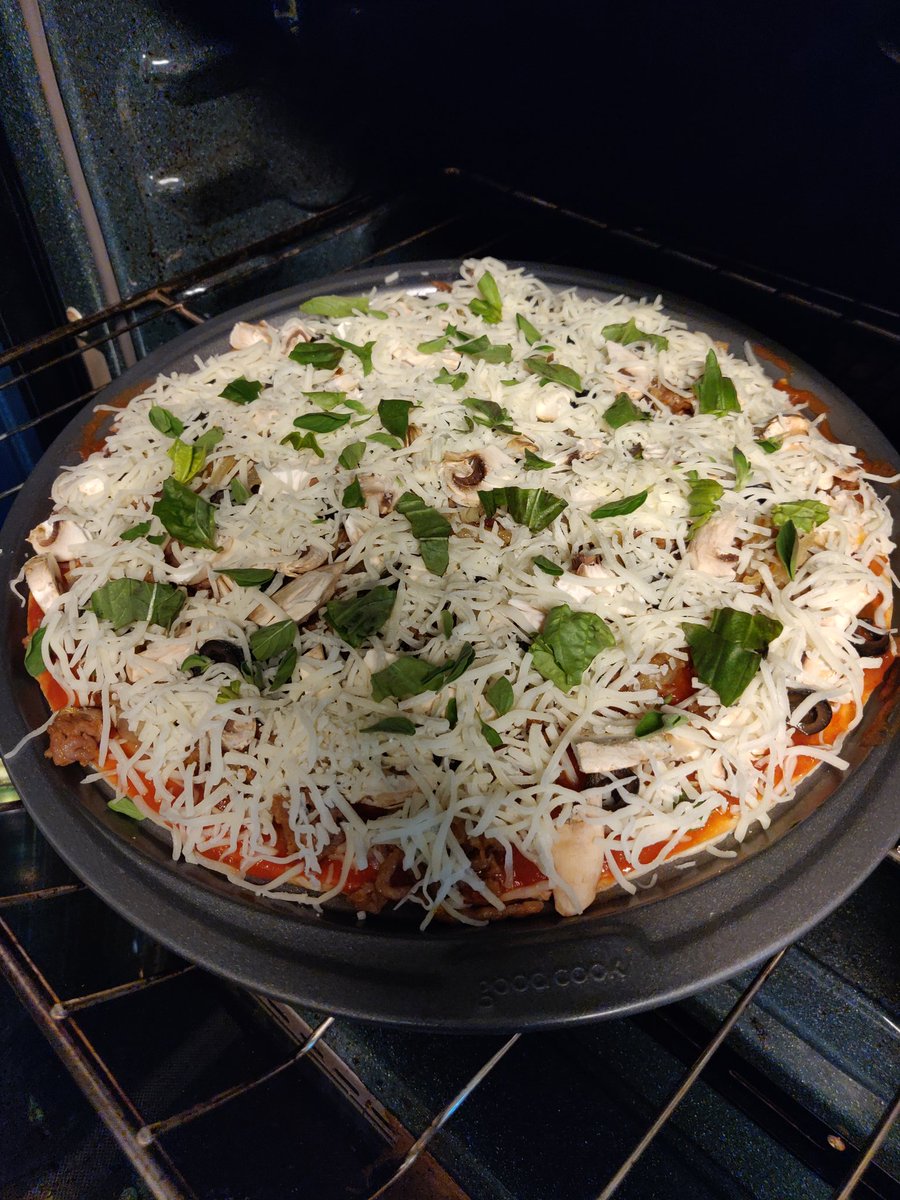 whychristians's tweet photo. I made a pizza. Homemade marinara, carmelized onion, sausage, olives and mushroom. 

So. Damn. Good. If I do say so myself https://t.co/pLnVAonqvF