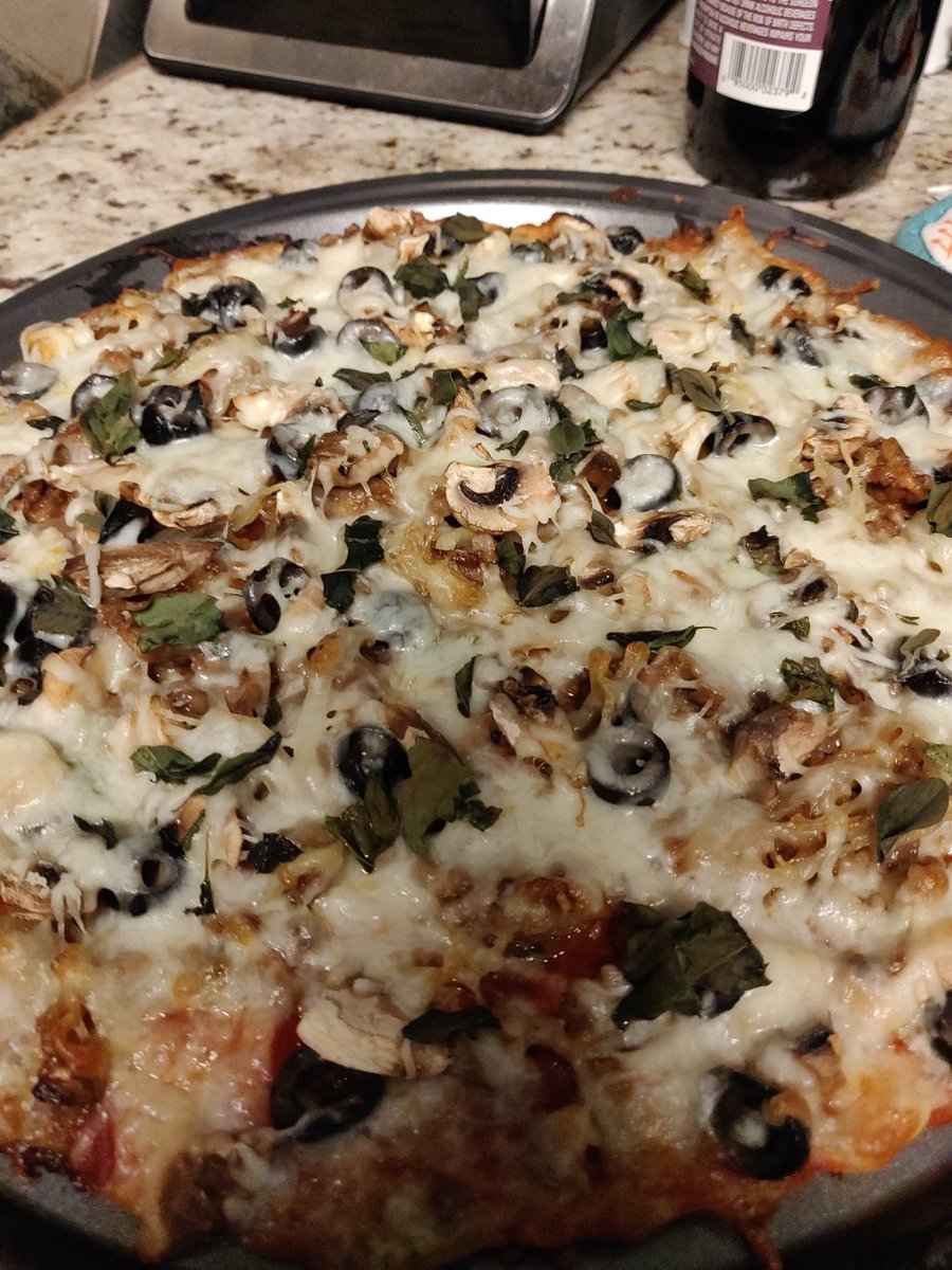 whychristians's tweet photo. I made a pizza. Homemade marinara, carmelized onion, sausage, olives and mushroom. 

So. Damn. Good. If I do say so myself https://t.co/pLnVAonqvF
