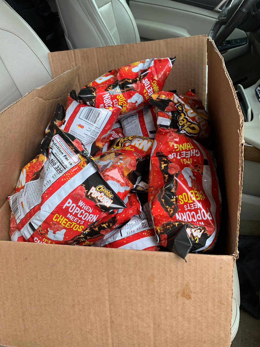 ampeaches12's tweet photo. @Fritolay @ChesterCheetah 20 bags of the rebranded flamin popcorn bought - only to find out that the flavor changed. So disappointed. #bringbacktheoldbag https://t.co/LNyzaLsncX