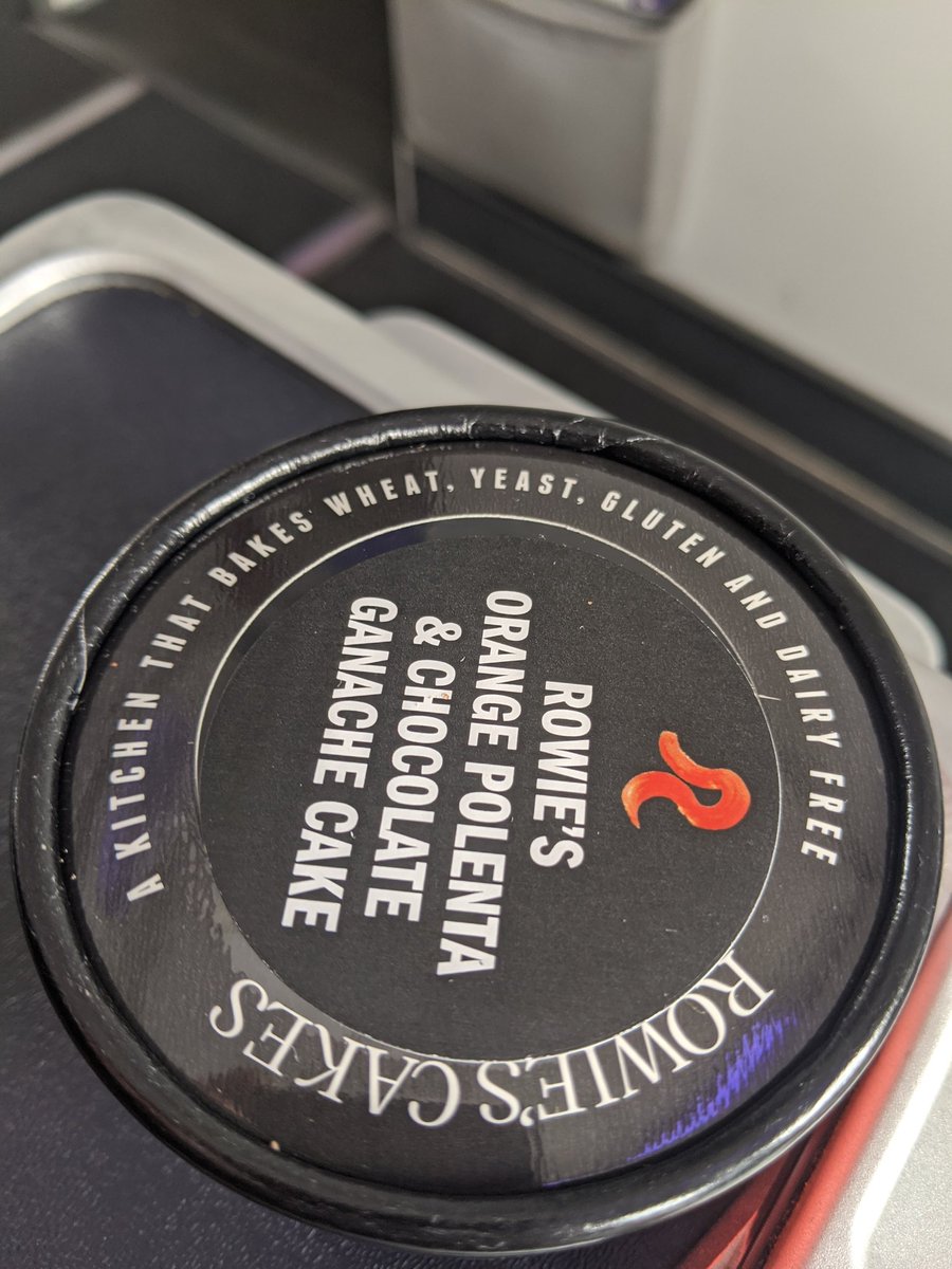 A cake package that reads "A kitchen that bakes wheat, yeast, gluten and dairy free"