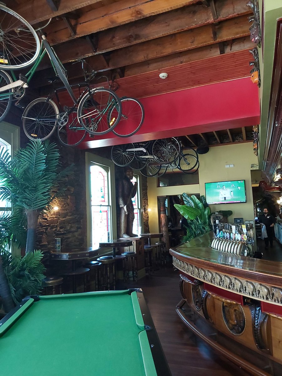  #PubCrawl: The Bombay Bicycle Club is an Indian-Raj themed pub in Ovingham.It lives up to its theme, which it took on 2002, with real attitude - bikes on the ceiling, monkey head bar taps, tigers and British-era Indian ephemera.Originally opened in 1880 as the Ovingham. – at  The Bombay Bicycle Club