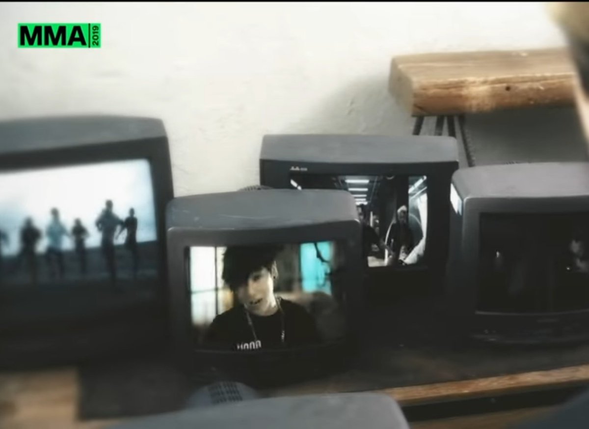 First thing we notice is these old TV sets each showing various  @bts_twt MVs You can see- Save Me- INU- Fire- No More Dream- Danger &- Fake Love