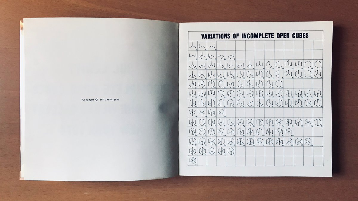 Incomplete Open Cubes book spread with a grid of all cube variations