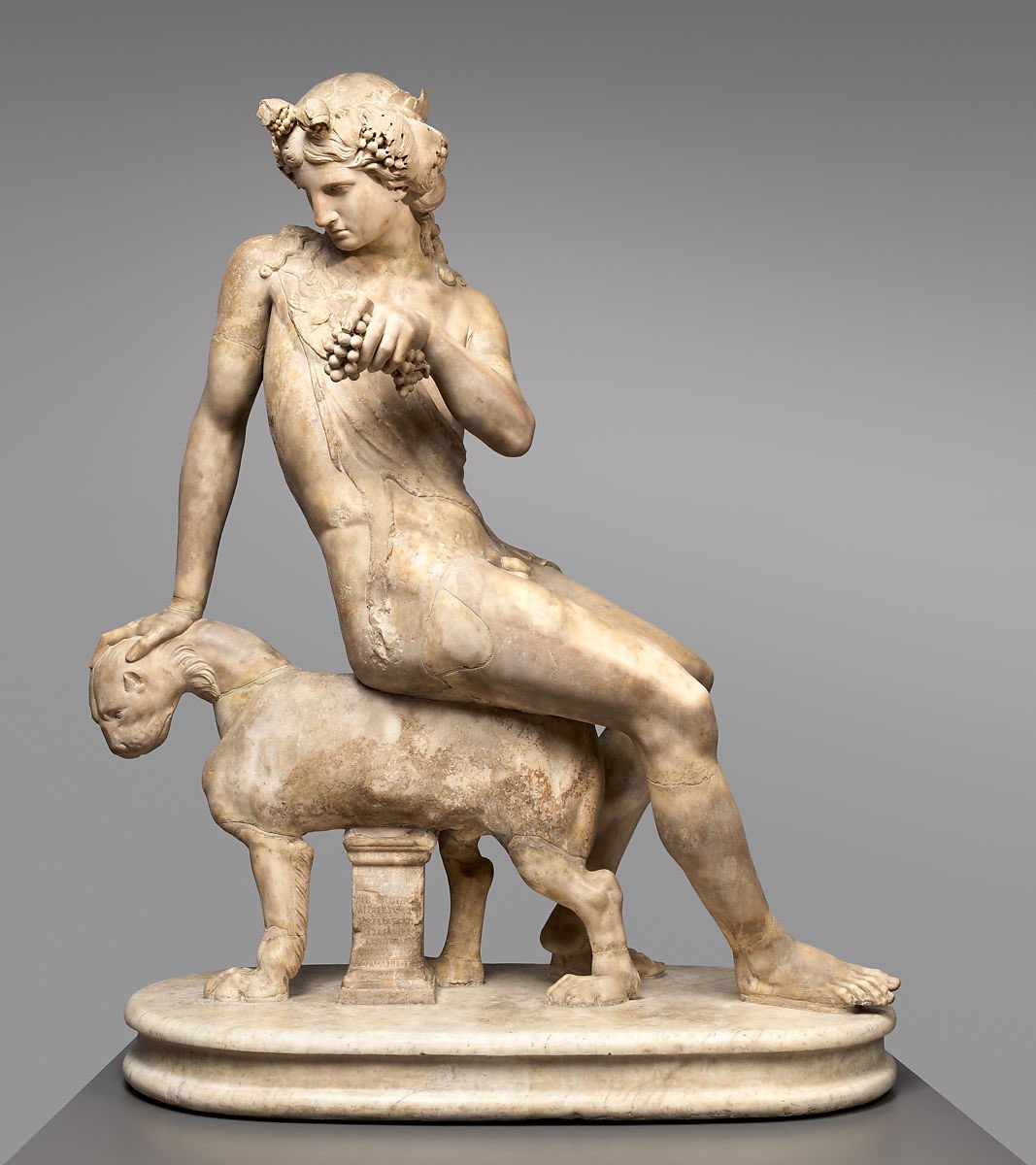 Full-length picture of Roman marble statue of Dionysos seated on a panther ...