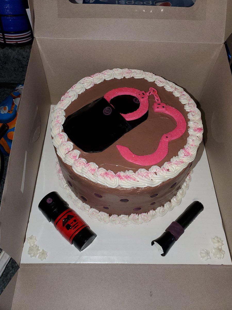 The craft of the day was a cake? 🤷‍♀️ It was fun and I think it's cute. #cake #handcuffs #pink #ocspray #sprinkles #chocolate