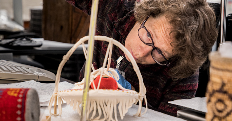 Rebecca Andrews catalogs Burke Museum acquisitions.