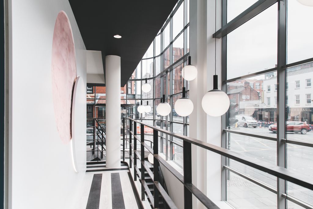 huckletree's tweet photo. "It’s a dream to open our first workspace in the old Express Building. It was considered ‘space-age’ back in the 1930s, and it still retains so much of that character." 👽🏢 @gabrielahersham talks our Manchester flagship #HuckletreeAncoats in @amagazineuk: https://t.co/ombAyUZ02s https://t.co/c6lmkLPEd8