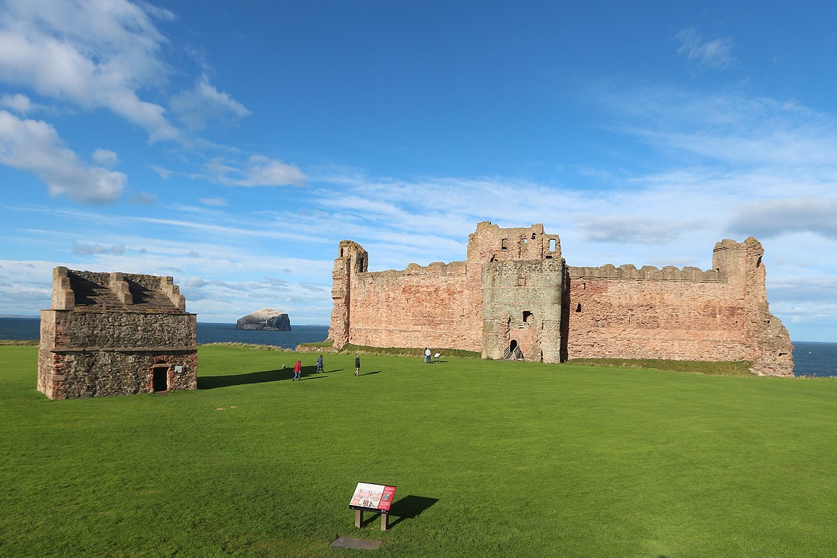 Tantallon Castle in East Lothian, with Bass Rock in the background and a sixteenth-century dovecot in the foreground