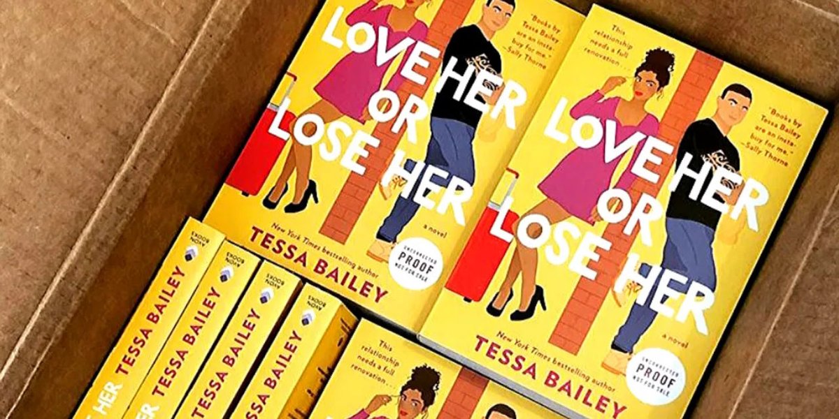 A box of copies of Tessa Bailey's Love Her or Lose Her