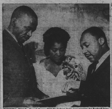 "BUSHNELL RALLY - Gospel Singer Mahalia Jackson looks over program for Bushnell benefit for burned Georgia churches, with the Rev. Richard Battles, left, one of the organizers of rally; and the Rev. Martin Luther King, main speaker at affair." Htfd Times 10/29/62 #MLK #MLKDay