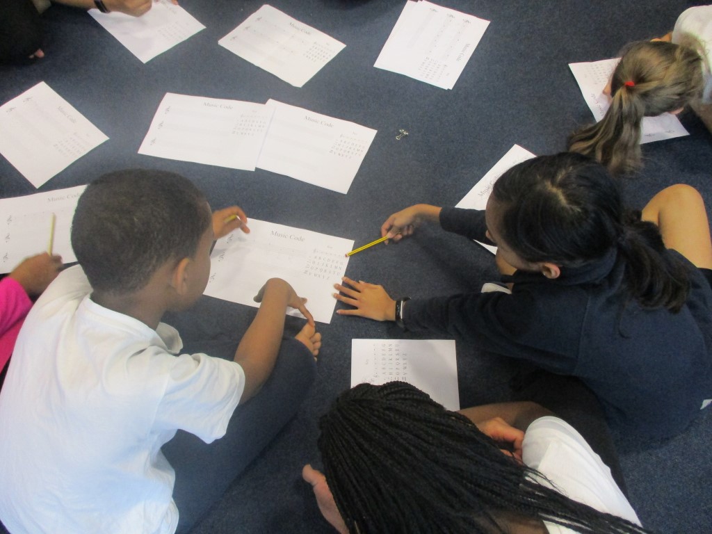 OGSPrimary's tweet photo. Year 6 got stuck into a workshop last week with #BletchleyPark and #Deafexplorer, representing codebreaking in maths, music and movement. It was a great session and our visitors were really impressed with the children’s engagement and participation. https://t.co/h5uwvOEyaC