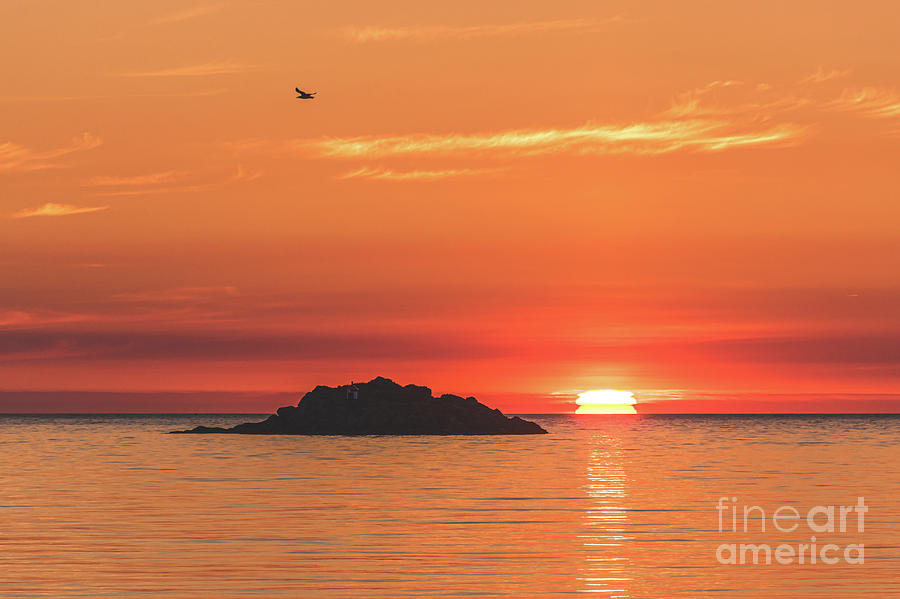 The midnight sun touches the sea to rise minutes later, and begin a new day.