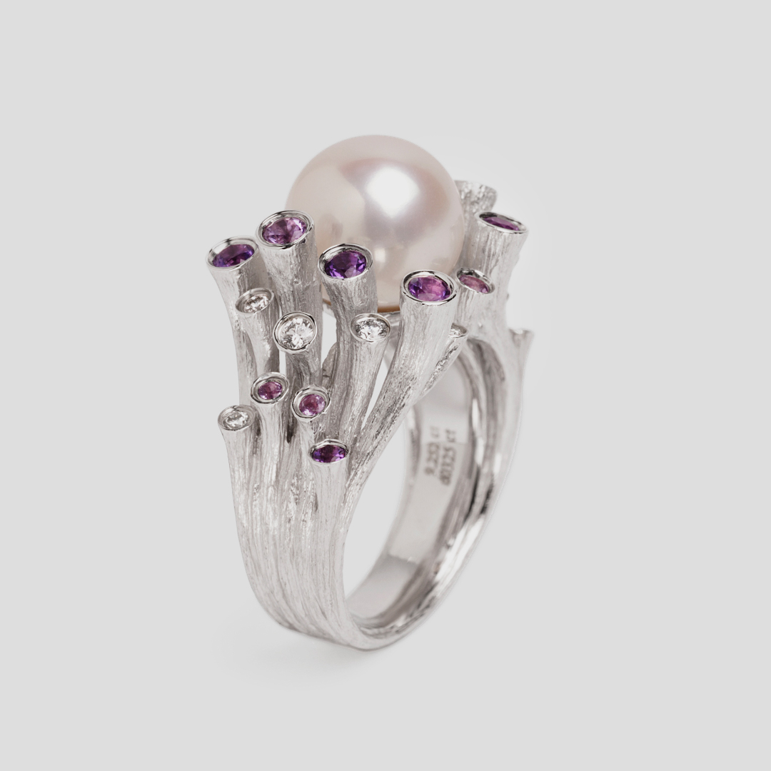 Fei Liu's Dawn ring with South Sea pearl, purple amethyst and diamonds set in 18ct white gold.