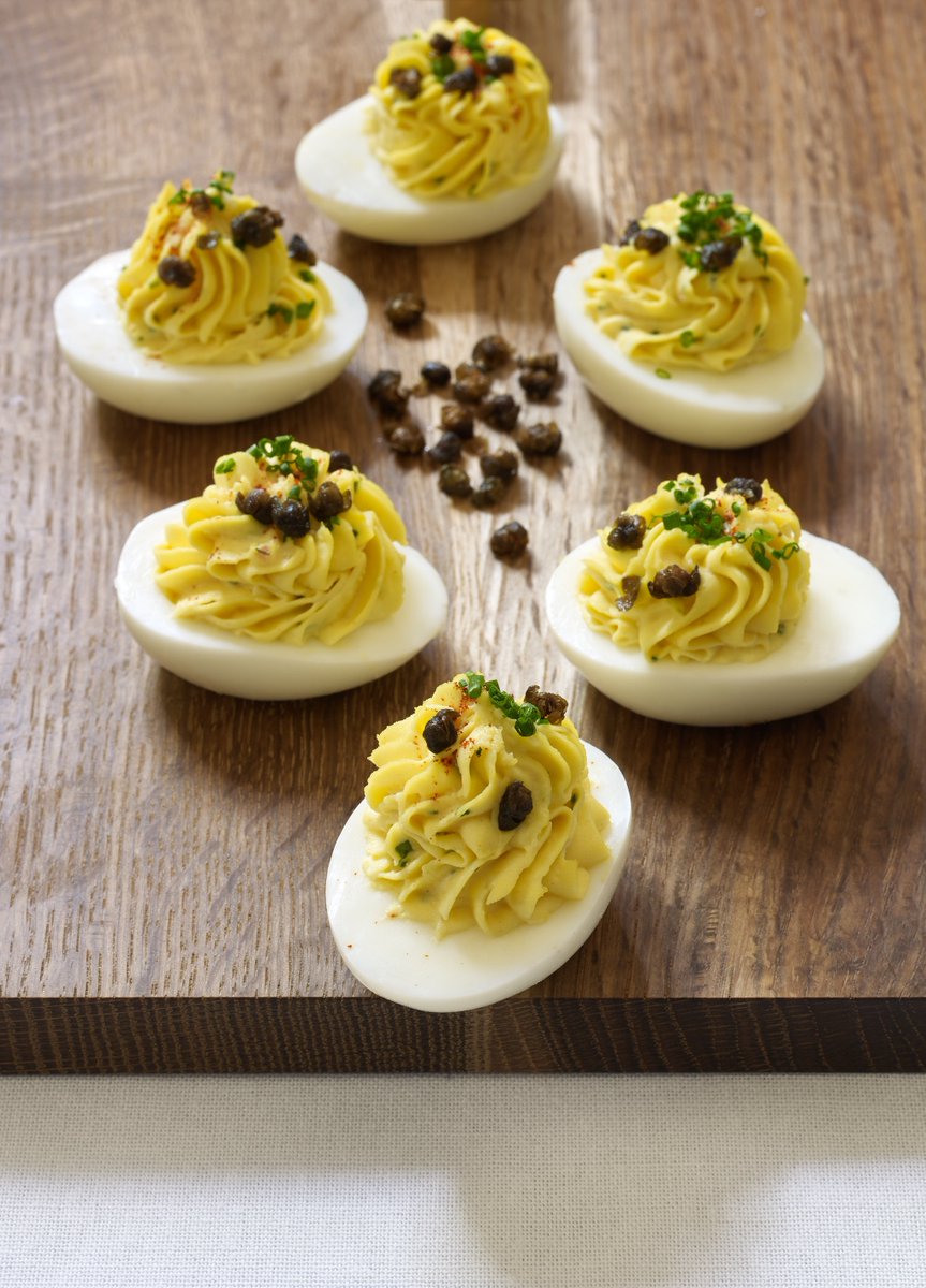 It's all about those crispy capers. Oeufs Mimosa | Deviled eggs with smoked paprika, crispy capers, and chives. #Yountville #LasVegas