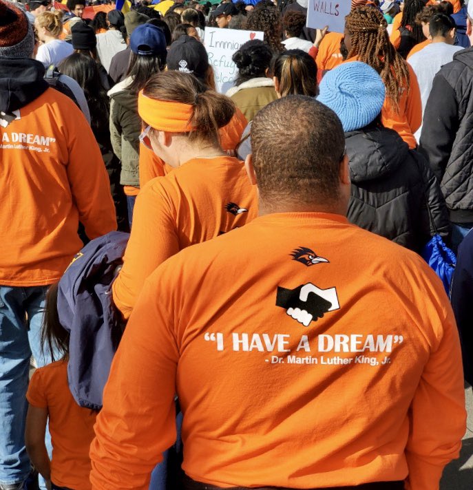 PresidentEighmy's tweet photo. Great morning marching with the Roadrunner community at San Antonio’s incomparable #MLKDay March! #MLKSA #UTSA https://t.co/uUzlnXgigt