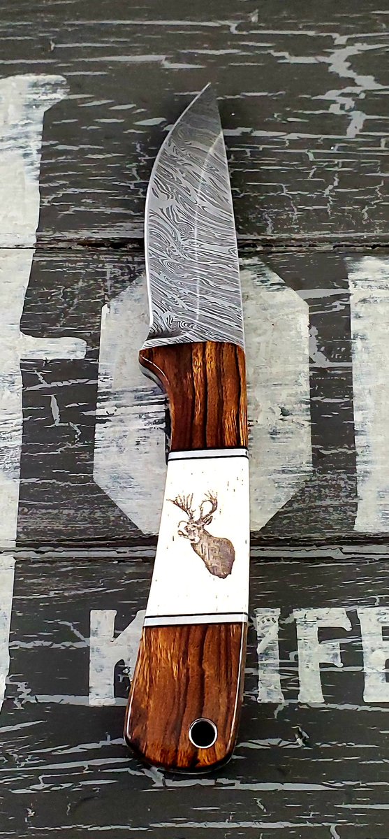 StoneKnifeworks's tweet photo. I finished this Damascus hunter with a ironwood and bone handle. Its engraved with the customers whitetail. #StoneKnifeworks https://t.co/NlffgsuqiG