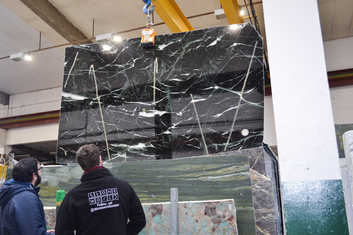 V E R I A S G R E E N 🍃 Antonio &amp; Tom having a good look at our latest bundle of Verias Green marble that has just arrived. (The zig zag white strips you see is just the protective tape)

More here: bit.ly/2ugsZse