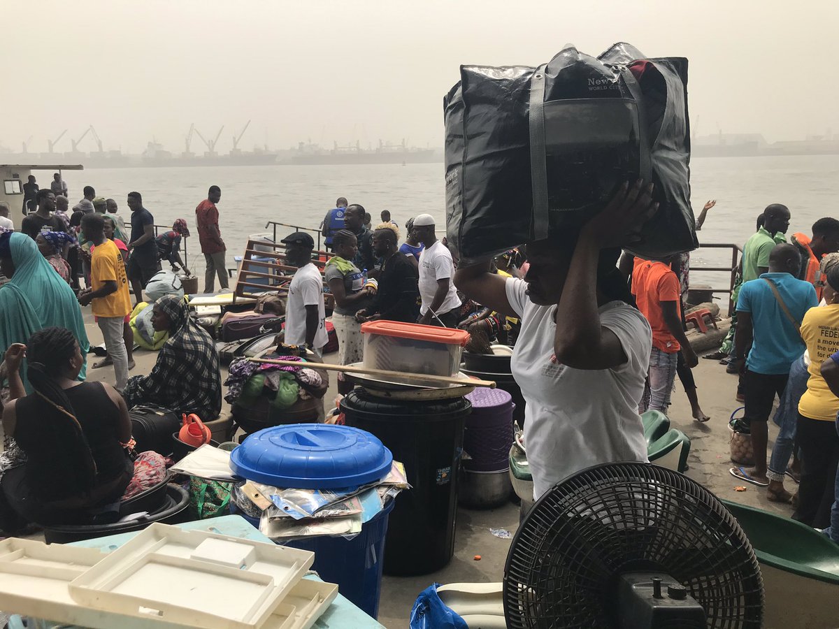 justempower's tweet photo. Lives scattered as #TarkwaBay community in #Lagos as @NigerianNavy chases thousands out with less than 1 hours’ notice, boatloads arriving at CMS jetty with all belongings and nowhere to go. #EndForcedEvictions #LagosOnFire https://t.co/bUfkOF1c4A