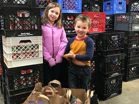 nfcchelp's tweet photo. We LOVE when we see the next generation getting involved in giving back! Claire and George did a reverse advent calendar over the holidays and collected items for the NFCC Food Pantry. Saturday they brought in everything they had collected! #nfcchelp #togetherwecanhelp https://t.co/Hjl9b2lh2x
