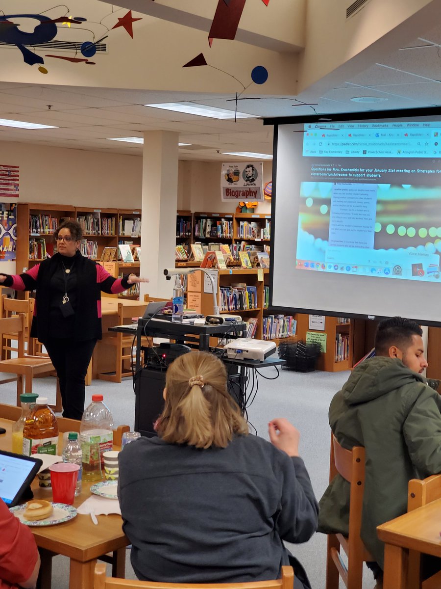 Key's Student Support Coordinator talking to assistants about strategies for defiant behavior. @KeySchoolAPS <a href="/APSVirginia/">Arlington Public Schools</a> @KeyAP_Maldonado @MPerdomo_KeyES