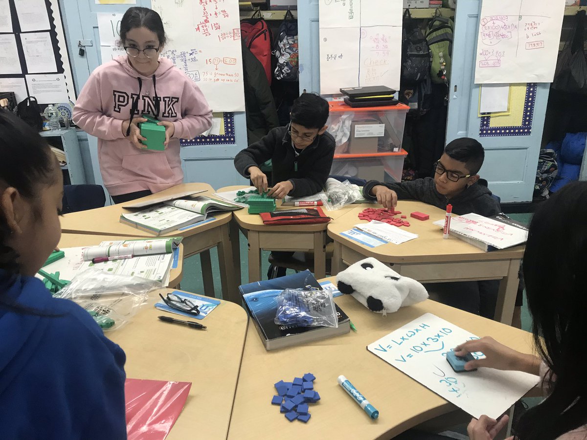 MadeFor5thGrade's tweet image. Students use tangible and visual representations to create their own prisms, while also finding the total volume using the standard formula. They even challenged themselves by creating and finding the volume of irregular figures! #HandsOnLearning
#AlgebraForAll
@PS66JKO
