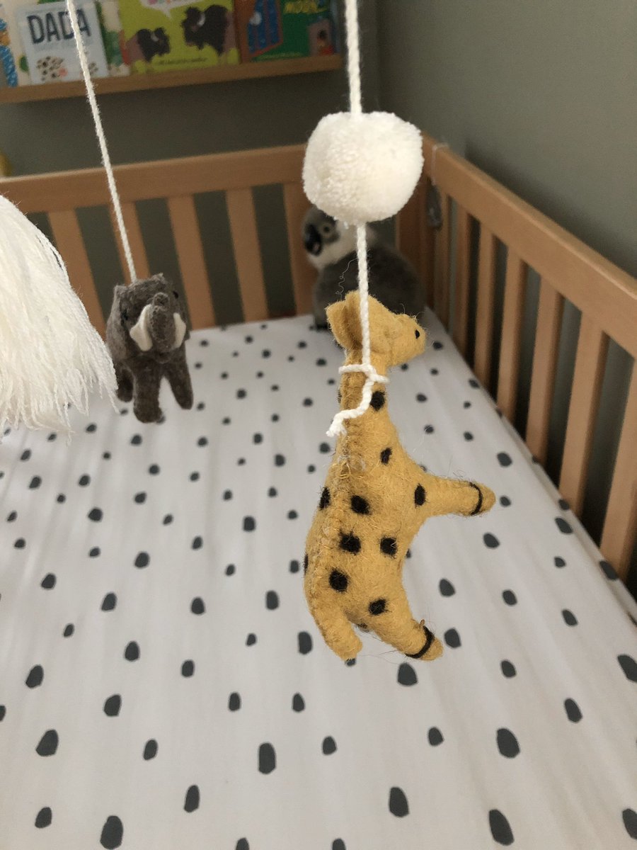 KayDogDiggity's tweet photo. Murphy has managed to pull the felt giraffe off the baby’s crib mobile. The only way my artistically challenged ass could remedy the situation was this... so now it looks like it’s hanged itself. 

Exposing our future child to wholesome imagery right from the start. https://t.co/HSGBLMFUdZ