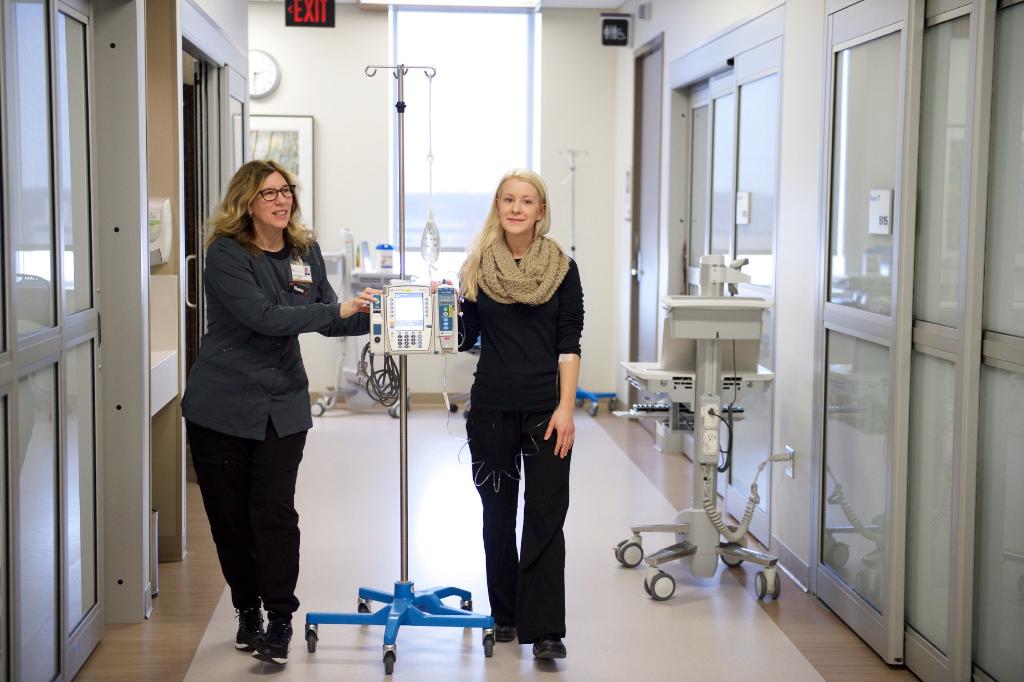 Patient walks down the hall