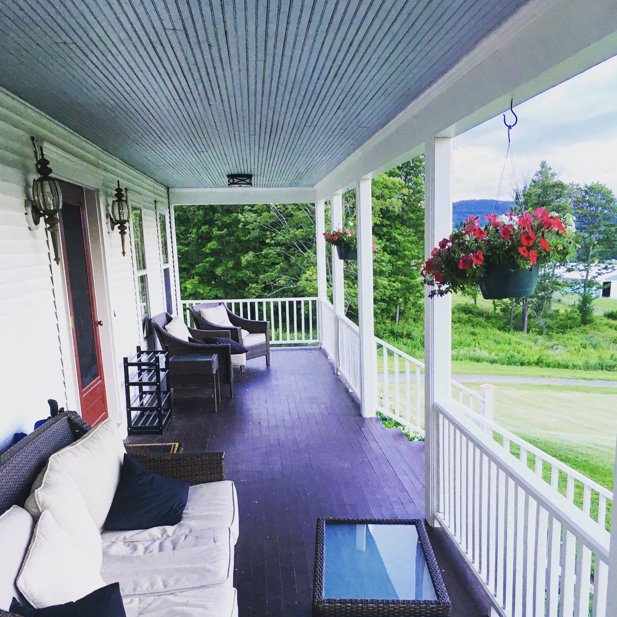 Is there anything more pleasing than a summer day out on the #porch? 
#design #architecture #home #outdoorspace #entertaining #wood #beadboardceiling #railings #frontdoor #farmhouse #farm #newyork #colonialarchitecture #veranda #steps #hillsdale