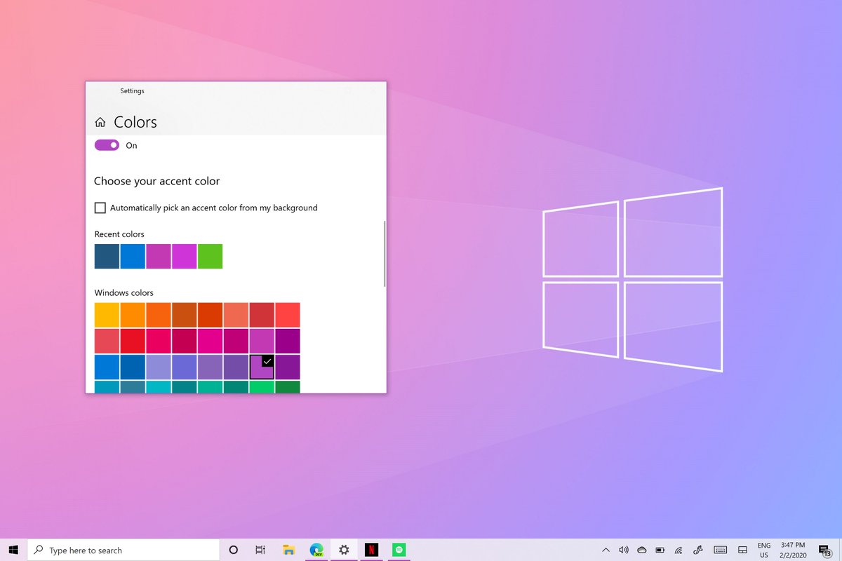 Screenshot of desktop. wallpaper is set to a fan made version of the windows logo, but done with a light pink and purple background